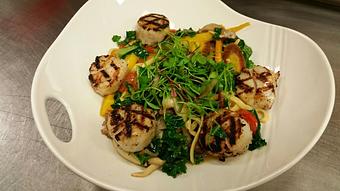 Product: Fresh egg linguine with sautéed wild mushrooms, shallots, heirloom carrots, cherry tomatoes, kale and fresh thyme in a white wine and garlic sauce, topped with wood fired scallops - Michael Anthony's at the Inn in Versailles, OH Restaurants/Food & Dining