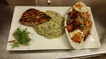 Product: Wood-fired Block Island Swordfish over a creamy basil pesto risotto with an baked heirloom tomato gratin - Michael Anthony's at the Inn in Versailles, OH Restaurants/Food & Dining