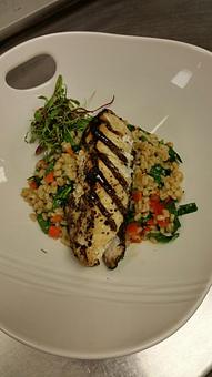 Product: Wood-fired Atlantic Halibut over pearled barley with spinach chiffonade, cherry tomatoes, and mirepoix - Michael Anthony's at the Inn in Versailles, OH Restaurants/Food & Dining