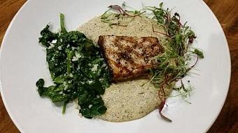 Product: Wood-fired Block Island Swordfish over creamy Buckwheat polenta with sautéed ice root spinach and aged Provolone cheese. - Michael Anthony's at the Inn in Versailles, OH Restaurants/Food & Dining