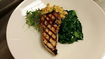 Product: Wood grilled Block Island Swordfish over Creole crawfish risotto with sauteed ice root spinach. - Michael Anthony's at the Inn in Versailles, OH Restaurants/Food & Dining