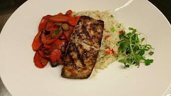 Product: Wood fired Mahi Mahi over jasmine rice pilaf and oven roasted heirloom carrots with honey and thyme. - Michael Anthony's at the Inn in Versailles, OH Restaurants/Food & Dining