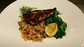 Product: Blackened Block Island Swordfish over Cajun style wild rice pilaf and sauteed spinach. - Michael Anthony's at the Inn in Versailles, OH Restaurants/Food & Dining