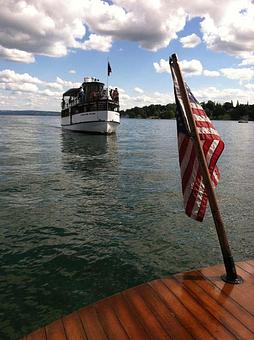 Product: The "Judge Ben Wiles" approaches the home dock in the village of Skaneateles.  Join us for a scenic cruise. - Mid-Lakes Navigation Company in Skaneateles, NY Business Services