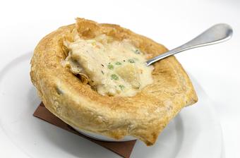 Product: COUNTRY CHICKEN POT PIE Roasted chicken breast, carrots, peas, potatoes, 
fresh sage béchamel sauce, puff pastry crust - Mill Creek Tavern in Bayville, NY American Restaurants