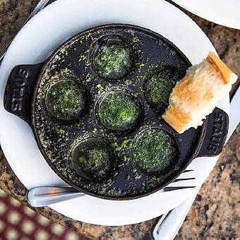 Product: Wild Escargots de Bourgogne ~ oven-roasted snails, garlic-herb butter - Mon Ami Gabi in Oakbrook Center - Oak Brook, IL French Restaurants