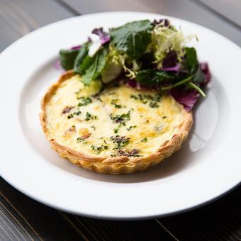 Product: QUICHE LORRAINE ~ thick-cut bacon, jarlsberg cheese, caramelized onions - Mon Ami Gabi in Oakbrook Center - Oak Brook, IL French Restaurants