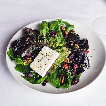 Product: candied pecans, cranberries, nigella seeds, champagne honey vinaigrette - Mon Ami Gabi in Oakbrook Center - Oak Brook, IL French Restaurants
