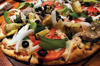 Product: Loaded with toppings! - Moosejaw Pizza in The Waterpark Capital of the World in Wisconsin Dells! - Wisconsin Dells, WI American Restaurants Product: Loaded with toppings! - Moosejaw Pizza in The Waterpark Capital of the World in Wisconsin Dells! - Wisconsin Dells, WI American Restaurants