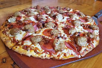 Product: Loaded with the meats! - Moosejaw Pizza in The Waterpark Capital of the World in Wisconsin Dells! - Wisconsin Dells, WI American Restaurants Product: Loaded with the meats! - Moosejaw Pizza in The Waterpark Capital of the World in Wisconsin Dells! - Wisconsin Dells, WI American Restaurants