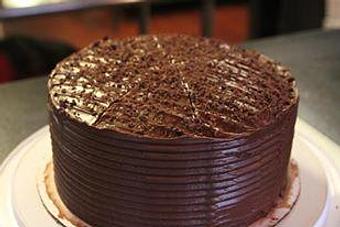 Product: Triple layer Chocolate Cake with Milk Chocolate Frosting - Nikolas Pizza in Newport, RI Pizza Restaurant