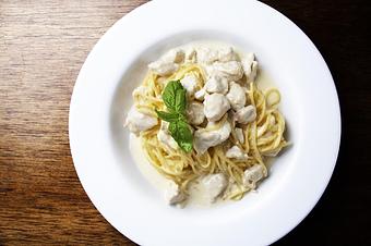 Product: Spaghetti, sautéed chicken, creamy parmesan sauce - Novecento Brickell in Miami, FL Steak House Restaurants