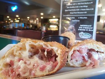Product: Reuben Rolls - Crispy Egg Rolls served with our Tangy Gourmet Reuben Sauce - crazy delicious! - O'Blarney's Pub & Restaurant in Olympia, WA Irish Restaurants