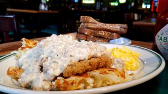 Product: Chicken Fried Steak served with two eggs, hashbrowns and toast. - O'Blarney's Pub & Restaurant in Olympia, WA Irish Restaurants