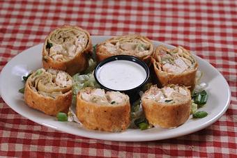 Product: Fried Bayou Wrappers...Our Famous Appetizer. Chicken, Andouille, Herbs, Cheese stuffed into a tortilla shell, rolled up and fried until perfectly browned. - O'Henry's Food & Spirits in Metairie, LA American Restaurants