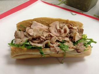 Product: Pork Loin Sandwich - On a Roll Sandwich Shoppe in Carlsbad, CA Delicatessen Restaurants