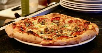 Product: Seasonally inspired menu with daily specials. Pictured: Pepperoni Pizza. - Onespeed in Sacramento, CA Pizza Restaurant
