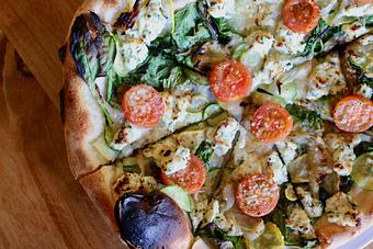 Product: Seasonally inspired menu with daily specials. Pictured: Seasonal Garden Pie. - Onespeed in Sacramento, CA Pizza Restaurant