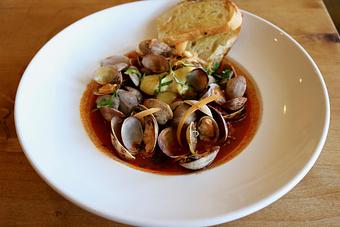 Product: Seasonally inspired menu with daily specials. Pictured: Clams with Chorizo - Onespeed in Sacramento, CA Pizza Restaurant