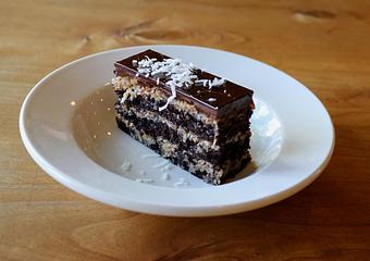 Product: Seasonally inspired menu with daily specials. Pictured: German Chocolate Cake with Coconut-Pecan Frosting - Onespeed in Sacramento, CA Pizza Restaurant