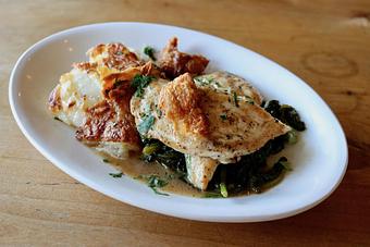 Product: Seasonally inspired menu with daily specials. Pictured: Grilled Mary's Chicken with Potato Gratin, Braised Greens, Black Peppercorn Jus - Onespeed in Sacramento, CA Pizza Restaurant