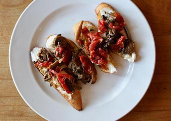Product: Seasonally inspired menu with daily specials. Pictured: Crostini with Braised Mushrooms, Crescenza Cheese, Cured Tomato - Onespeed in Sacramento, CA Pizza Restaurant