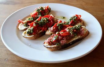 Product: Seasonally inspired menu with daily specials. Pictured: Crostini with Cotechino, White Bean Puree, Piquillo Peppers, Salsa Verde - Onespeed in Sacramento, CA Pizza Restaurant