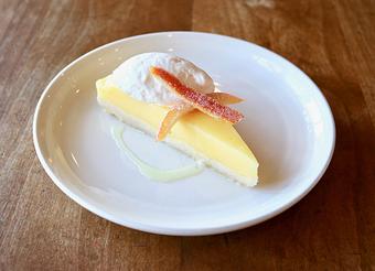 Product: Seasonally inspired menu with daily specials. Pictured: Lemon Bar with Sweet Cream, Candied Citrus - Onespeed in Sacramento, CA Pizza Restaurant