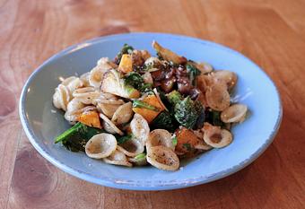 Product: Seasonally inspired menu with daily specials. Pictured: Orecchiette with Roasted Mushrooms & Squash, Cippolini Onions, Fried Brussels Sprouts, Braised Spinach, Brown Butter - Onespeed in Sacramento, CA Pizza Restaurant