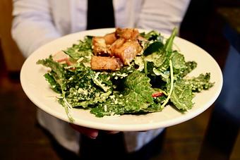Product: Kale Caesar Salad with Crispy Pork Belly, Parmesan, Radish, Croutons - Onespeed in Sacramento, CA Pizza Restaurant
