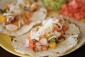 Product: Zihuatanejo Shrimp Tacos served with Black Beans & Street Corn on the Cob - Opal Divine’s Austin Grill in Travis Heights/ South Austin - Austin, TX American Restaurants