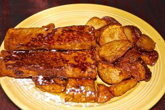 Product: Cinnamon Raisin Bread French Toast Sticks and choice of side - Opal Divine’s Austin Grill in Travis Heights/ South Austin - Austin, TX American Restaurants