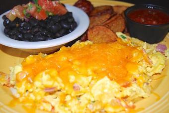 Product: Migas Plate - Opal Divine’s Austin Grill in Travis Heights/ South Austin - Austin, TX American Restaurants