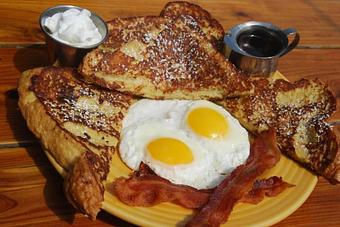 Product: Opal's Cinnamon Raisin Bread French Toast Combo - Opal Divine’s Austin Grill in Travis Heights/ South Austin - Austin, TX American Restaurants
