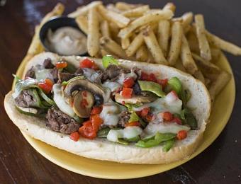 Product: Philly Cheesesteak & Fries - Opal Divine’s Austin Grill in Travis Heights/ South Austin - Austin, TX American Restaurants