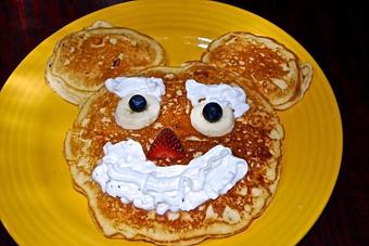 Product: Smiley Faced Pancake - Opal Divine’s Austin Grill in Travis Heights/ South Austin - Austin, TX American Restaurants