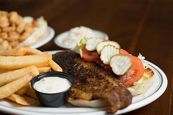 Product: Blackened Whitefish Po' Boy - Original Oyster House Boardwalk in Gulf Shores, AL Seafood Restaurants