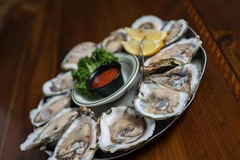 Product: Oysters on the Half Shell* - Original Oyster House Boardwalk in Gulf Shores, AL Seafood Restaurants