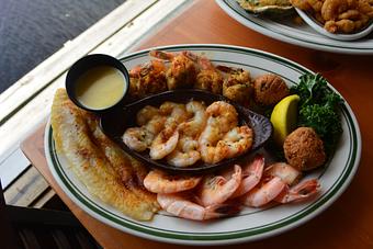 Product: Broiled Seafood Lover's Platter - Original Oyster House Boardwalk in Gulf Shores, AL Seafood Restaurants