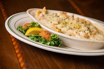 Product: Parmesan Baked Shrimp, Shrimp Alfredo Baked Pasta - Original Oyster House Boardwalk in Gulf Shores, AL Seafood Restaurants