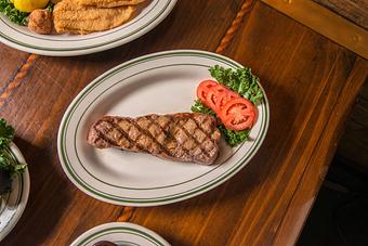 Product: New York Strip Steak - Original Oyster House Boardwalk in Gulf Shores, AL Seafood Restaurants