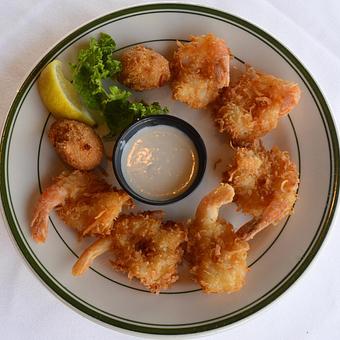 Product: Coconut Shrimp with Piña Colada Sauce - Original Oyster House Boardwalk in Gulf Shores, AL Seafood Restaurants