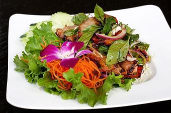 Product: marinated pork, mixed green, chili, mint, basil, cilantro, red & green onion, kaffir lime leaf in spicy lime dressing - Osha Thai Noodle Cafe in Tenderloin - San Francisco, CA Thai Restaurants Product: marinated pork, mixed green, chili, mint, basil, cilantro, red & green onion, kaffir lime leaf in spicy lime dressing - Osha Thai Noodle Cafe in Tenderloin - San Francisco, CA Thai Restaurants