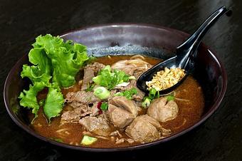 Product: sliced beef, beef balls, fried garlic, bean sprout, cilantro, onions in beef stew broth - Osha Thai Noodle Cafe in Tenderloin - San Francisco, CA Thai Restaurants Product: sliced beef, beef balls, fried garlic, bean sprout, cilantro, onions in beef stew broth - Osha Thai Noodle Cafe in Tenderloin - San Francisco, CA Thai Restaurants