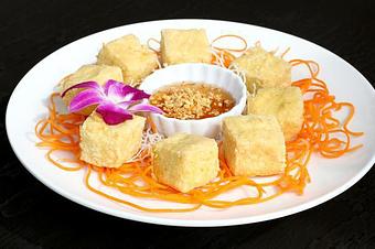 Product: With sweet and sour plum dipping sauce and crushed peanuts. - Osha Thai Noodle Cafe in Tenderloin - San Francisco, CA Thai Restaurants Product: With sweet and sour plum dipping sauce and crushed peanuts. - Osha Thai Noodle Cafe in Tenderloin - San Francisco, CA Thai Restaurants