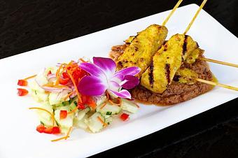 Product: With peanut sauce and fresh cucumber salad. - Osha Thai Noodle Cafe in Tenderloin - San Francisco, CA Thai Restaurants Product: With peanut sauce and fresh cucumber salad. - Osha Thai Noodle Cafe in Tenderloin - San Francisco, CA Thai Restaurants