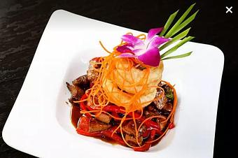 Product: Grilled angus flank steak, basil, black pepper, bell peppers in lava sauce with crispy onion rings - Osha Thai Noodle Cafe in Tenderloin - San Francisco, CA Thai Restaurants Product: Grilled angus flank steak, basil, black pepper, bell peppers in lava sauce with crispy onion rings - Osha Thai Noodle Cafe in Tenderloin - San Francisco, CA Thai Restaurants