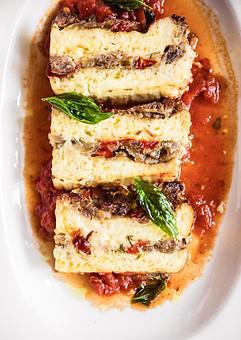 Product: House-Made Sausage & Vegetable Strata - Osteria Via Stato in River North - Chicago, IL Italian Restaurants