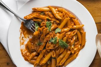 Product: all-natural chicken, fresh mozzarella, tomato cream sauce - Osteria Via Stato in River North - Chicago, IL Italian Restaurants