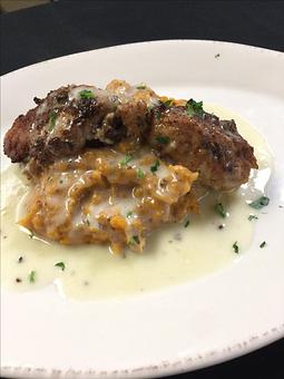Product: Tender veal pockets stuffed with bitter radicchio, robiola cheese and caramelized onions, pan-fried and topped with a lemon butter sauce and whole-grain mustard mashed sweet potatoes. - Paesano Restaurant & Wine Bar in Ann Arbor, MI Italian Restaurants
